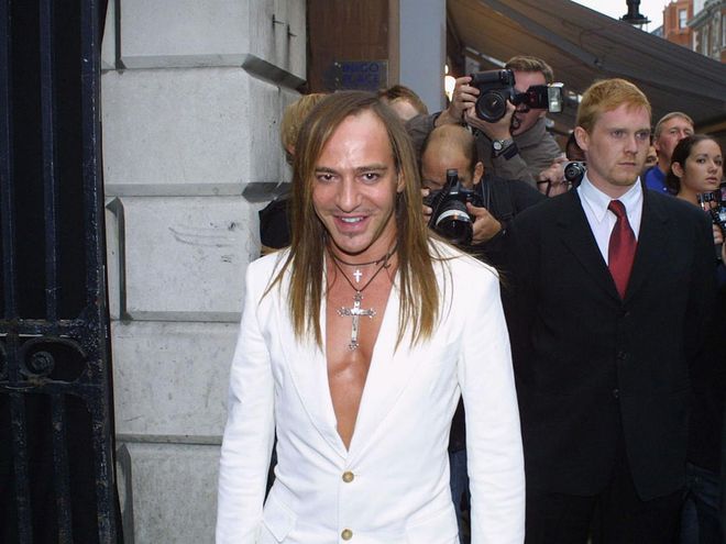 We would expect no less from John Galliano attending a wedding. Photo: Rex Features