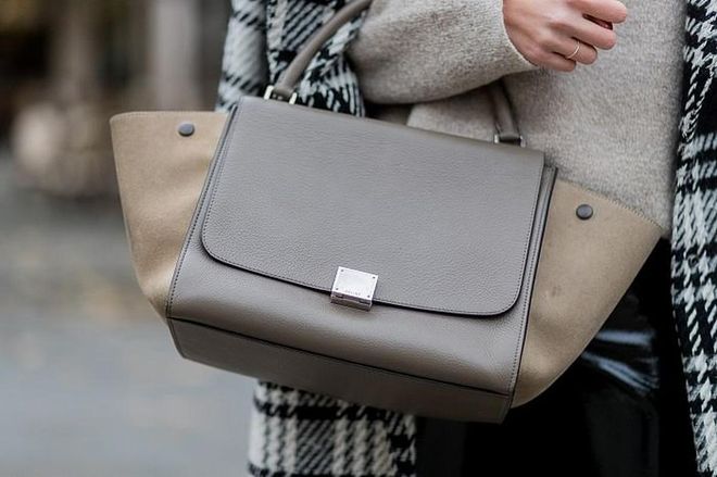 Distinctive and instantly recognisable, Celine's Trapeze bag holds its worth. Photo: Getty 