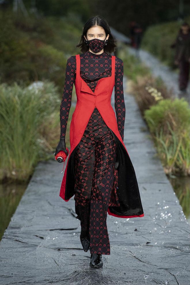 Marine Serre's red bustier-dress-cape situation is giving us major Matrix feels. 

Photo: Showbit