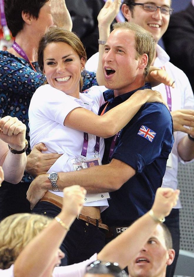More comfortable than ever with life in the public eye, Prince William and Duchess Kate didn’t hold back from showing their love for each other at the 2012 Olympics. After holding hands at an equestrian event, the couple went a step further and hugged tenderly in front of the cameras after celebrating a Team GB win at a track cycling final. Another big win for the royal family? Princess Anne's daughter Zara Tindall won the silver medal with the British equestrian team.

Photo: Pascal Le Segretain / Getty