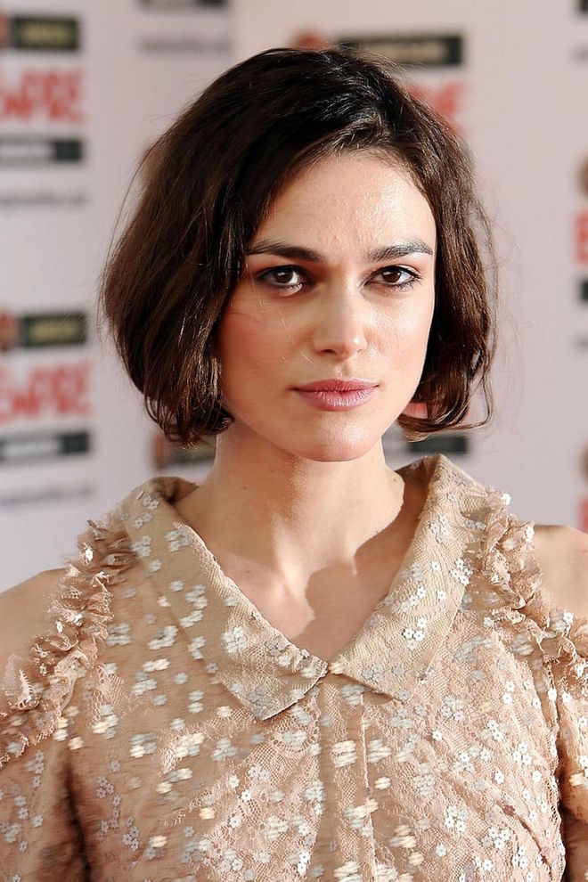 Knightley often straight-irons her short bob, but we love the natural texture of this lived-in, wavy look.