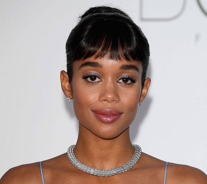 Laura Harrier proved that there's a way to wear glitter that feels not only chic but also bridal. With the rest of your makeup kept wedding-classic (full coverage foundation, pinky nude lipstick, pop of blush, defined brows), your eyes should become the playground for experimentation. A swipe of super-fine shimmer along the middle of the lid makes your eyes look brighter and bigger. Take a heavy-handed approach with mascara (or falsies) to finish the look.
Photo: Getty