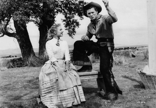 You may already know the musical from the famous song "Oh, What a Beautiful Morning"—composed by legendary duo Oscar Hammerstein II and Richard Rogers—that sees a country girl caught in a love triangle between a farm hand and a cowboy. The musical draws inspiration from the play Green Grow the Lilacs and there's nothing quite like the movie adaptation. Photo: Getty