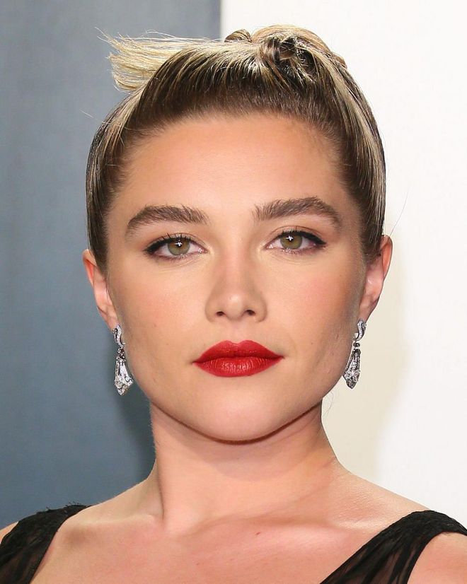 The addition of a sophisticated red lip transformed Pugh's beauty look for the Vanity Fair Oscar Party, and proved it's the best partner to inky black eyeliner. Try the Pat McGrath LabsMatteTrance Lipstick in Obsessed, a rich and vibrant orangy-red, to get the look.