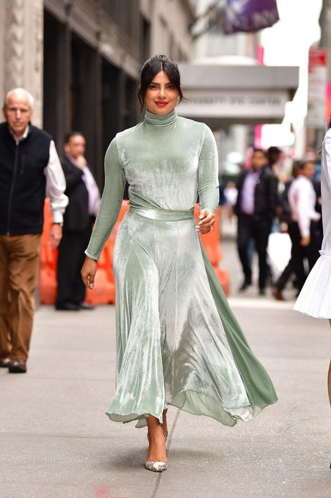 In a pistachio green velvet dress and silver pumps while out in New York City.

Photo: Getty