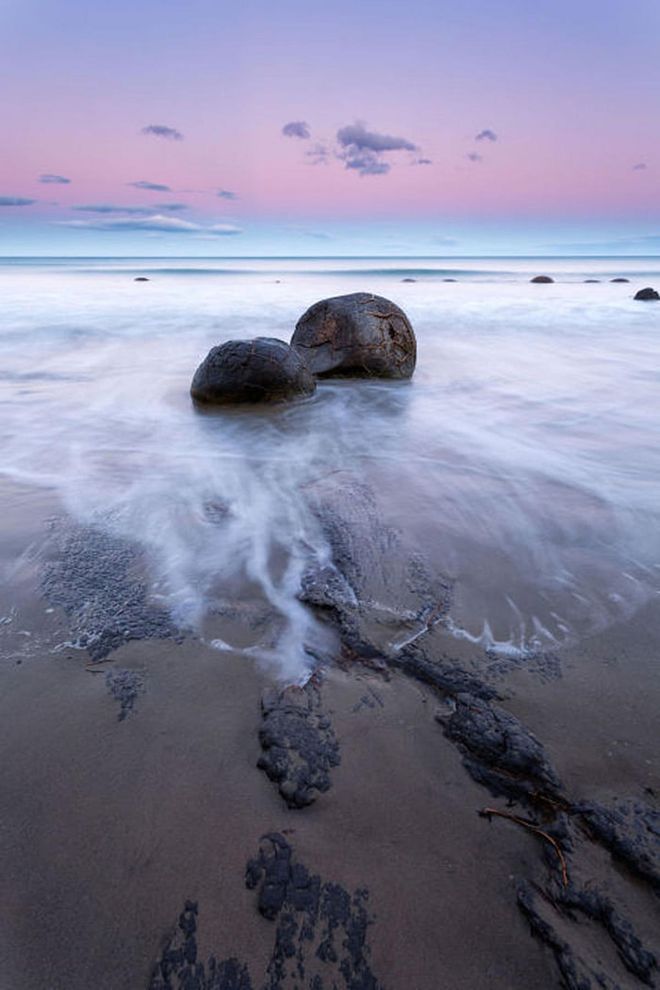 According to Maori legend, the marble-like Moeraki Boulders on Koekohe Beach are the remains of the ancient Araiteuru canoe that crashed into the Otago coast.