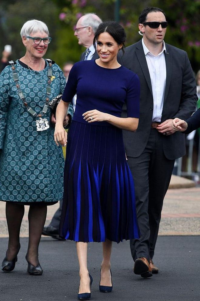The Duchess made her last few public appearances in a Givenchy indigo blue Milano knit top and bespoke pleated skirt.