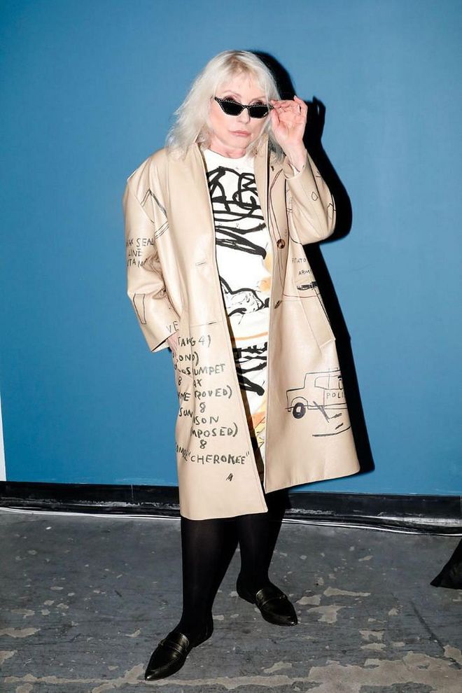Debbie Harry mixed things up in a doodled trench coat.

Photo: Courtesy of Coach