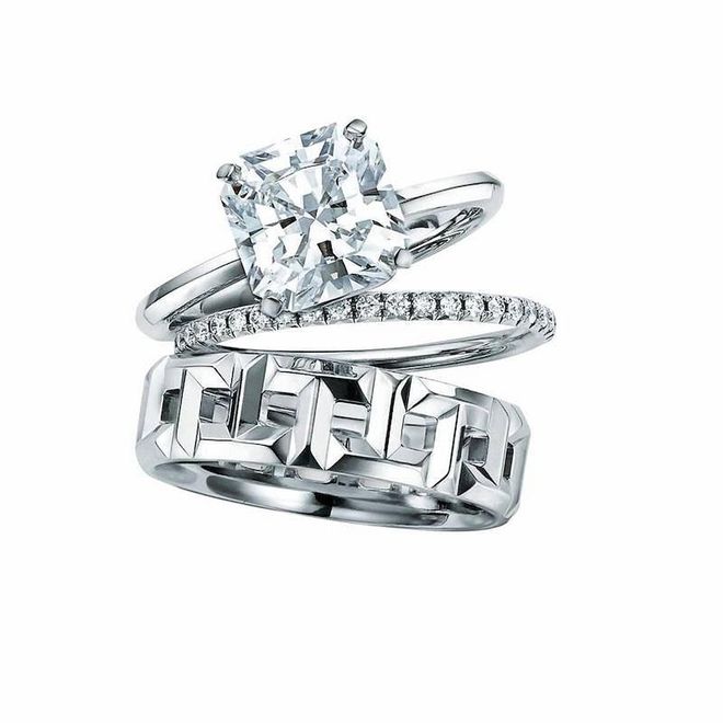 Platinum and diamond Tiffany True engagement ring; platinum and diamond Tiffany Metro ring; white gold Tiffany T True (wide) ring. (Photo: Tiffany & Co.)