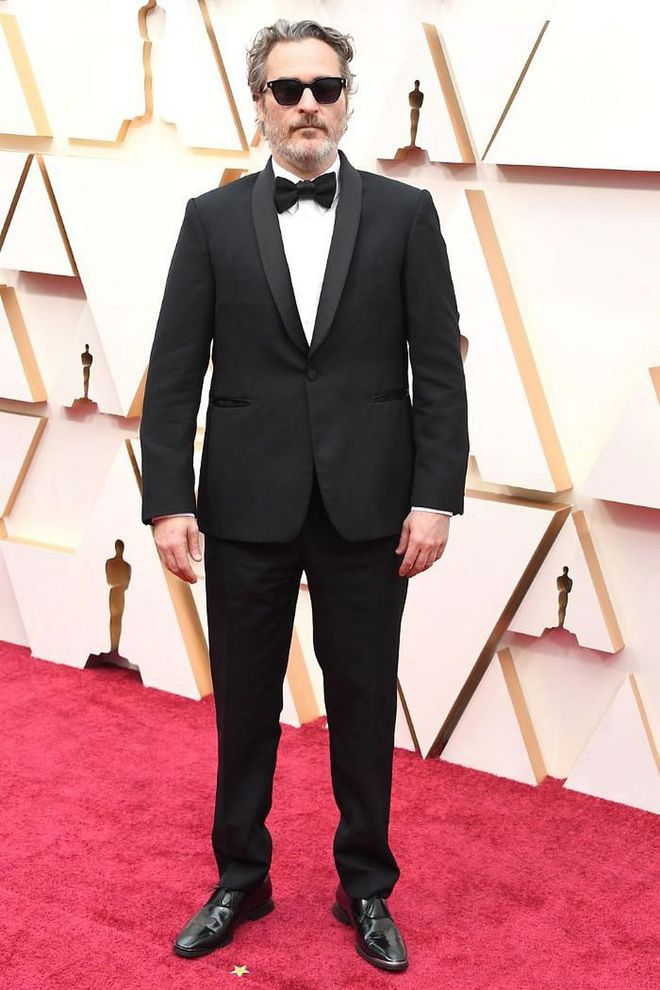 Lead Actor winner Joaquin Phoenix wore a sustainable Stella McCartney suit for the 2020 Oscars, the same one he had worn all awards season, in an effort to reduce waste and to draw attention to the climate emergency.

Photo: Steve Granitz / Getty