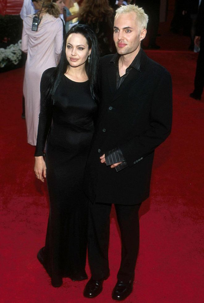 Angelina Jolie channels her inner Morticia Addams at the Academy Awards in 2000 with brother James Haven, where she picked up the Best Supporting Actress award for Girl Interrupted