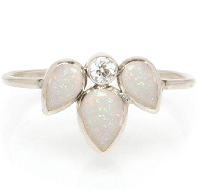 14kt gold ring with opal and diamond, $540, zoechicco.com.