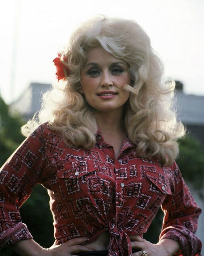 When you think platinum blonde curls and layers, only one name comes to mind: Dolly Parton.

Photo: Getty