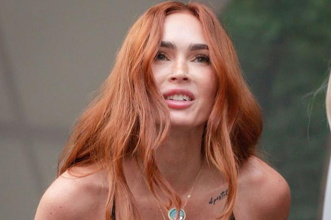 Megan Fox wears plunging sheer dress for Sports Illustrated party