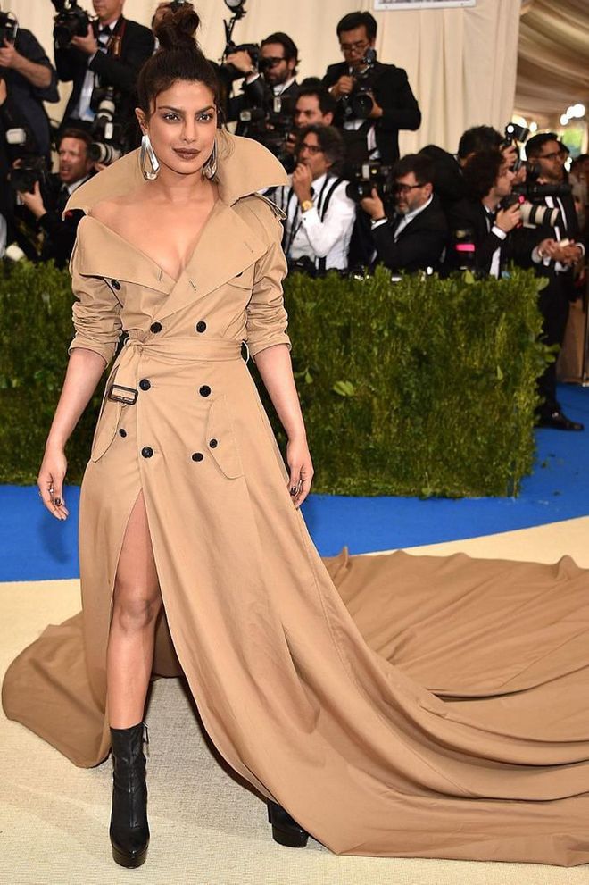 It's hard to stand out from the crowd of dramatic dresses that flood the red carpet at the Met Gala, but Priyanka Chopra somehow managed it by opting for something slightly different in 2017. Channelling the theme of that year - paying tribute to Rei Kawakubo/Comme des Garçons - the actress stole the show in a Ralph Lauren trench coat dress featuring a cascading train. Now, of course, the moment is just as well known for being the night she first met her now-husband, Nick Jonas, who was also a guest of Ralph Lauren. A lucky dress indeed.

Photo: Getty