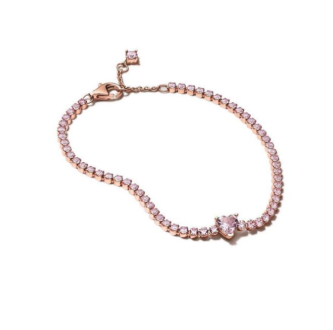 Rose gold-plated Sparkling Heart Tennis bracelet with orchid pink crystals, $249 (Photo: PANDORA)