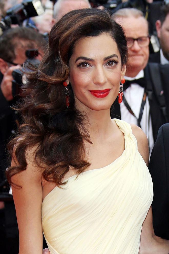 The lawyer and activist's ruby lips stood out at the Cannes premiere of her husband's film Money Monster.

