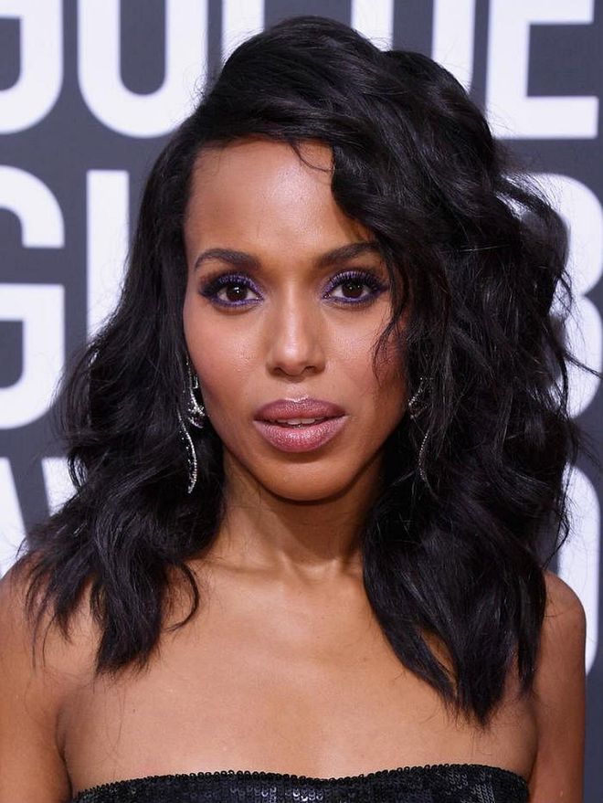 Kerry Washington looking pretty as a picture with amethyst eyes and violet-lined lids.