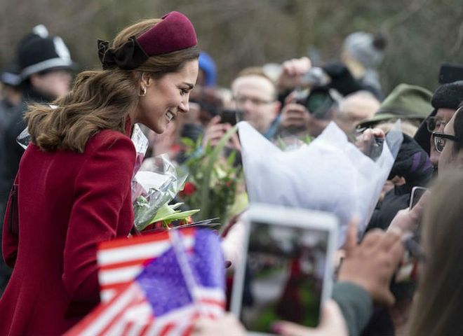 Kate paired her coat with a burgundy Jane Taylor headband