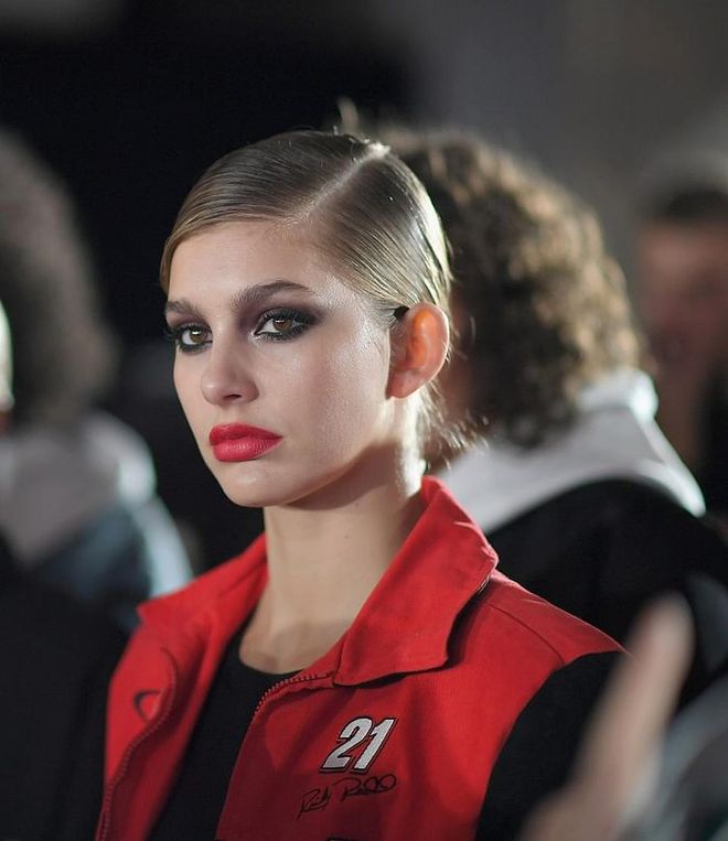 It's all about drama at Philipp Plein. Intense smokey eyes are pulled out till the temples and paired with bold red or deep burgundy lips. The rest of the face is enhanced subtly so that the eyes and lips take center-stage. Photo: Getty  
