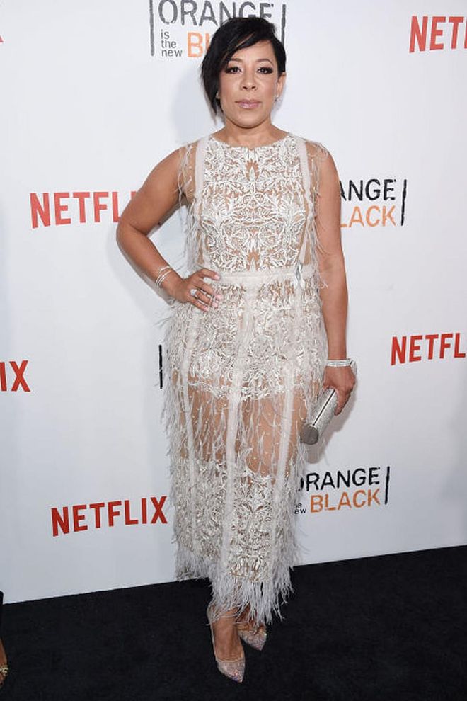 Cuban-born actress Selenis Leyva portrays Gloria excellently, but she looks quite different in real life — just check out this edgy lace number.