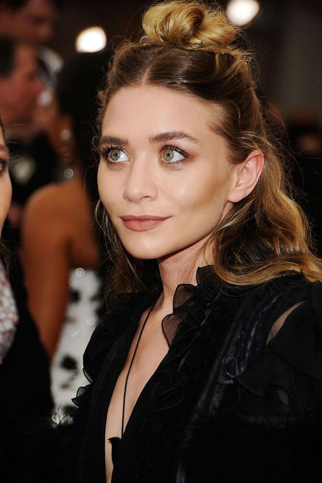 Ashley Olsen adds extra drama with a loosely-pinned bun. Photo: Getty