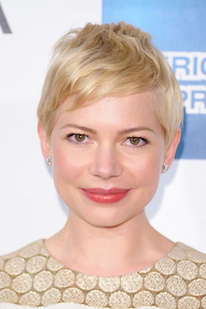 This pixie style looks fresh on oval face shapes, especially if you opt for piece-y layers in your hair for greater texture up top. To get unruly post-shower hair to fall in line, work product like a mousse or paste through short hair before blow drying to avoid duck feather flyaways.