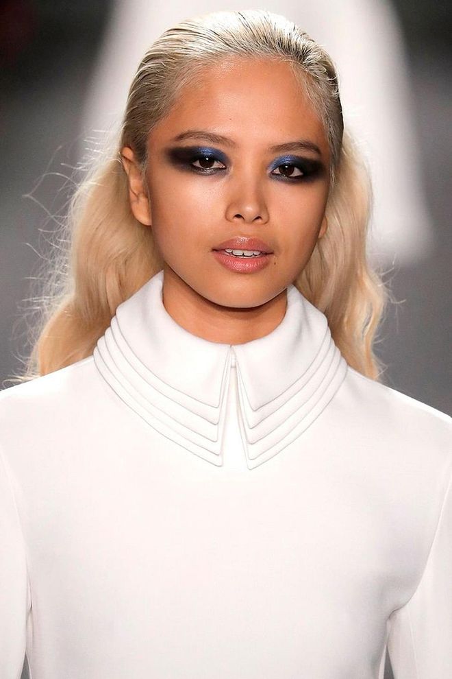 At Brandon Maxwell, hair was gelled down from the roots the mid-lengths, while the ends were curled into fluffy waves.