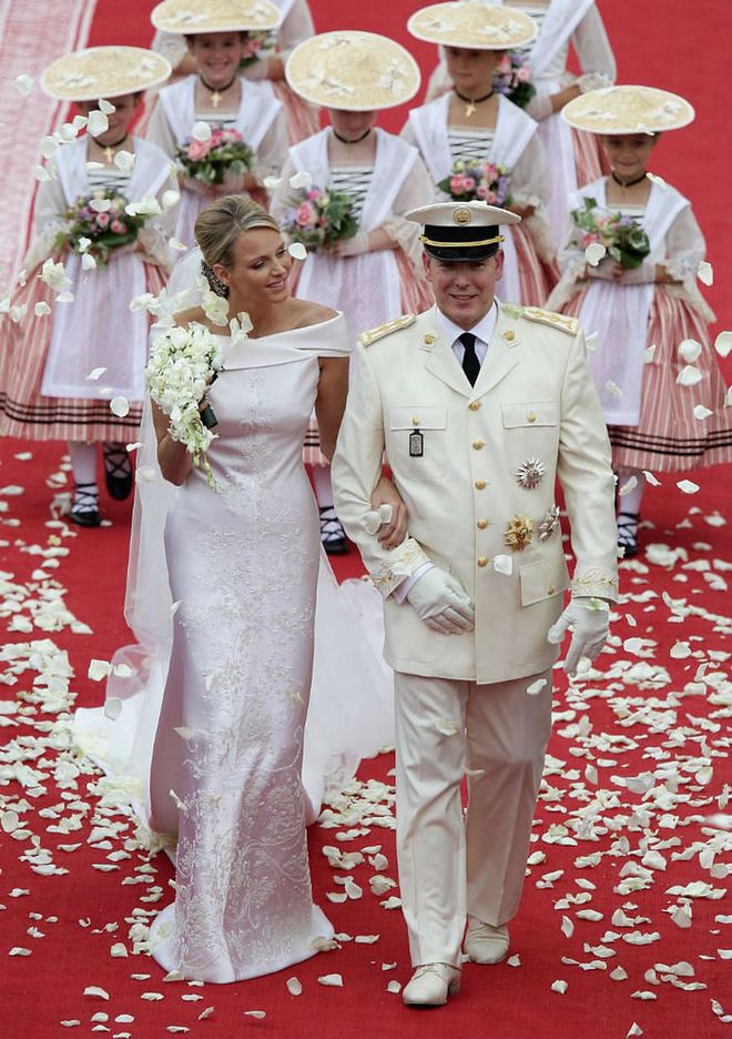 The South African Olympic swimmer met Prince Albert II of Monaco (the son of Grace Kelly) in 2000, when she was in Monaco for a competition. The couple dated for years and made their first public appearance in 2006, at the Olympic Games in Torino. The two wed on July 2, 2011.

 Photo: Getty