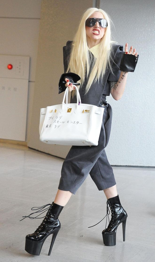 Eight years ago, Lady Gaga flaunted her hand-scribbled Birkin in Tokyo, where she let her Little Monsters express messages of love and admiration.  
Photo: Getty