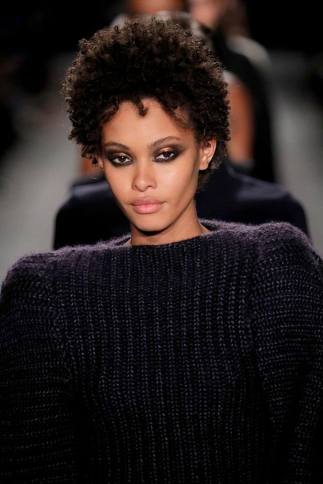 It's all about the eyes at Brandon Maxwell. The models strutted down the runway donning a heavy, smokey cat eye in various shades of black, navy and grey. The lower lash line is heavily lined, elongated and smoked out with dark shadow and each model had a pop of colour (mostly gold, silver and blue) on the center of their lids for dimension. The dramatic eye look is set against flawless, satin matte skin with hardly any colour anywhere else; Edgy and smoldering. Photo: Getty 