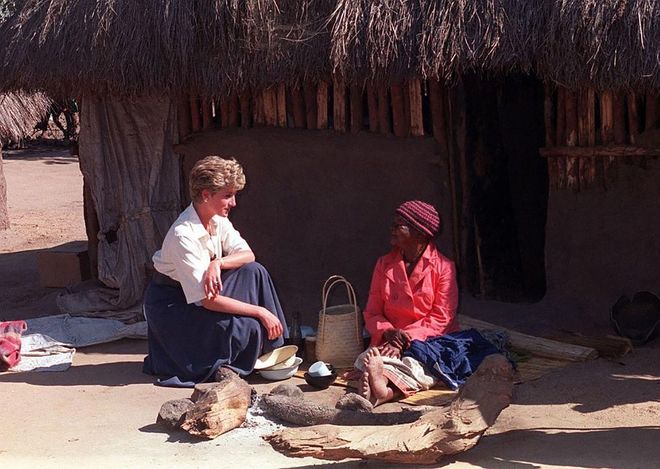 Speaking to a woman at the Tongogara Refugee Camp in Zimbabwe.

