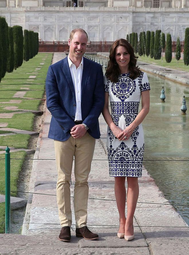 Public displays of affection are frowned upon for the Royal Family—especially when traveling. Royals are expected to never make those from another, more conservative, culture feel uncomfortable by showing signs of affection publicly. Case in point: William and Catherine's stoic poses during their visit to the Taj Mahal in 2016.
Photo: Getty
