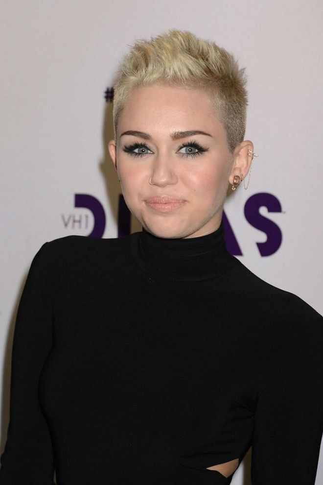 Miley Cyrus (also a former cover girl) shaved the sides of her head to give her cut some extra cool dimension.  Photo: Getty
