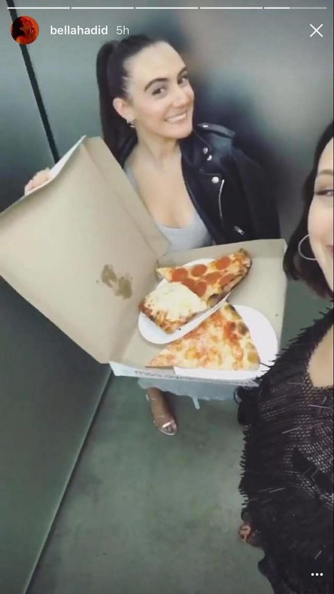 The pizza is so distracting you almost don't notice her Alexander Wang Met after-party look.
Photo: Snapchat
