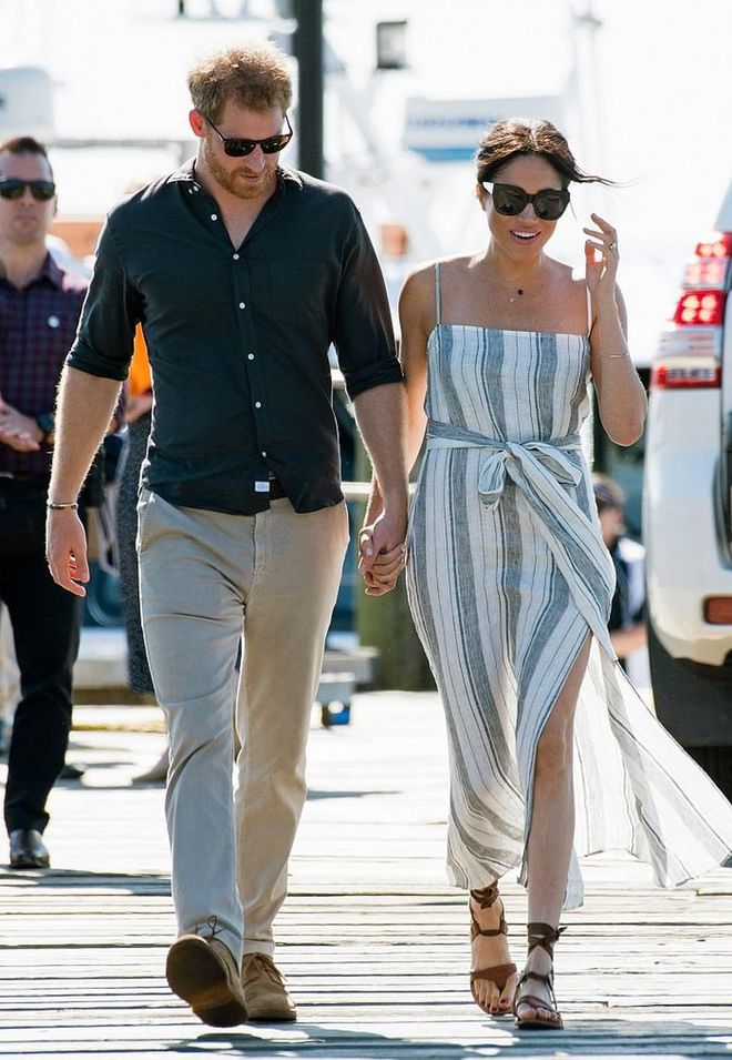 Meghan explored Fraser Island with her hubby in a summery Reformation dress and Karen Walker 'Northern Lights' sunglasses. The duchess opted to pair the look with Sarah Flint 'Grear' lace up sandals​.