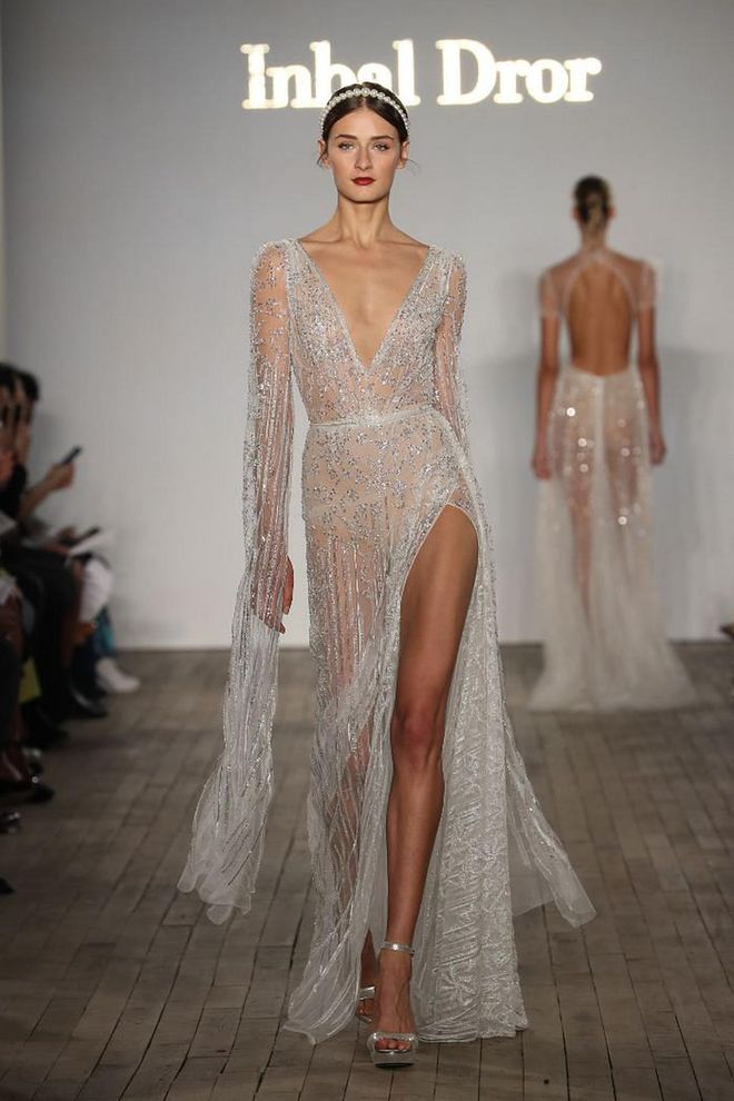 Some things never go out of style, and glitzy frocks are one of them. Sophisticated and glamorous, the runway saw sparkly stunners in terms of metallic embellishments, sequins, and tonal beading frocks from designers such as Theia and Inbal Dror, making for the perfect evening nuptial outfit.