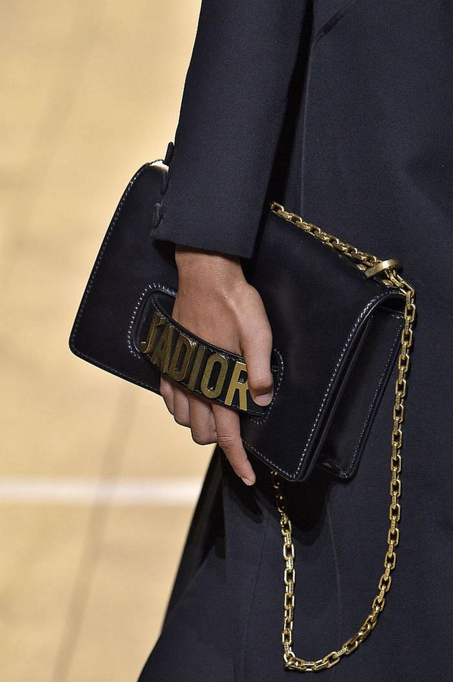 Seen at: Paris Fashion Week//Why we love it:   A classic shoulder box bag is given a new lease of life with "J'ADIOR" embellished proudly in gold. (Photo: Getty)