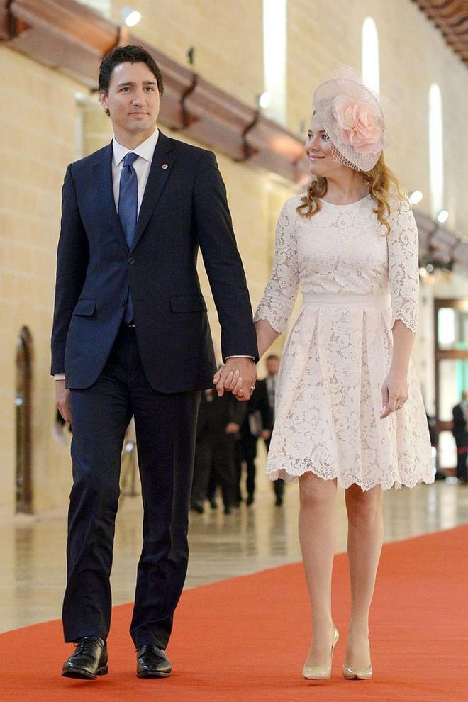 Walking hand in hand to the ceremony of the Commonwealth Heads of Government Meeting in Valletta, Canada. Photo: Getty