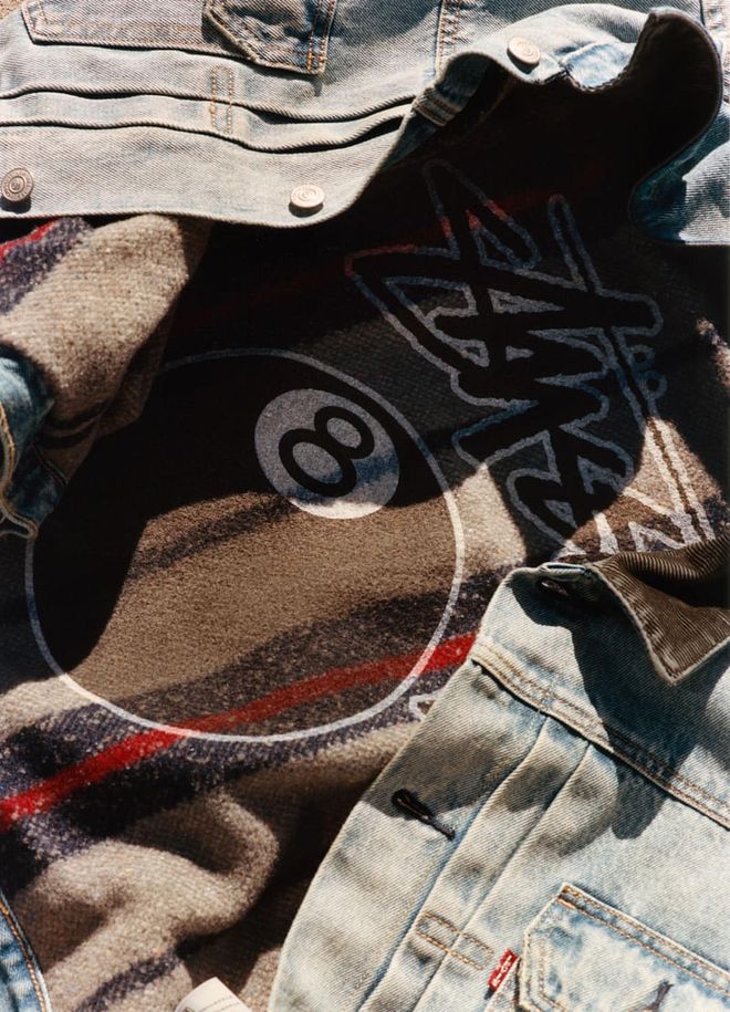 The Type II Trucker Jacket's inside lining with Stüssy’s eight-ball logo printed.