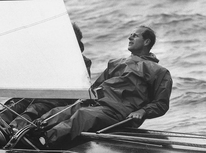 Prince Philip at the helm of his sailboat during the Cowes Regatta.