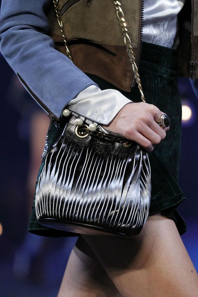 Seen at: New York Fashion Week//Why we love it: The sliced leather design hanging between a metallic chain handle gives this masterpiece a street punk edge that's both modern and cool. (Photo: Getty)