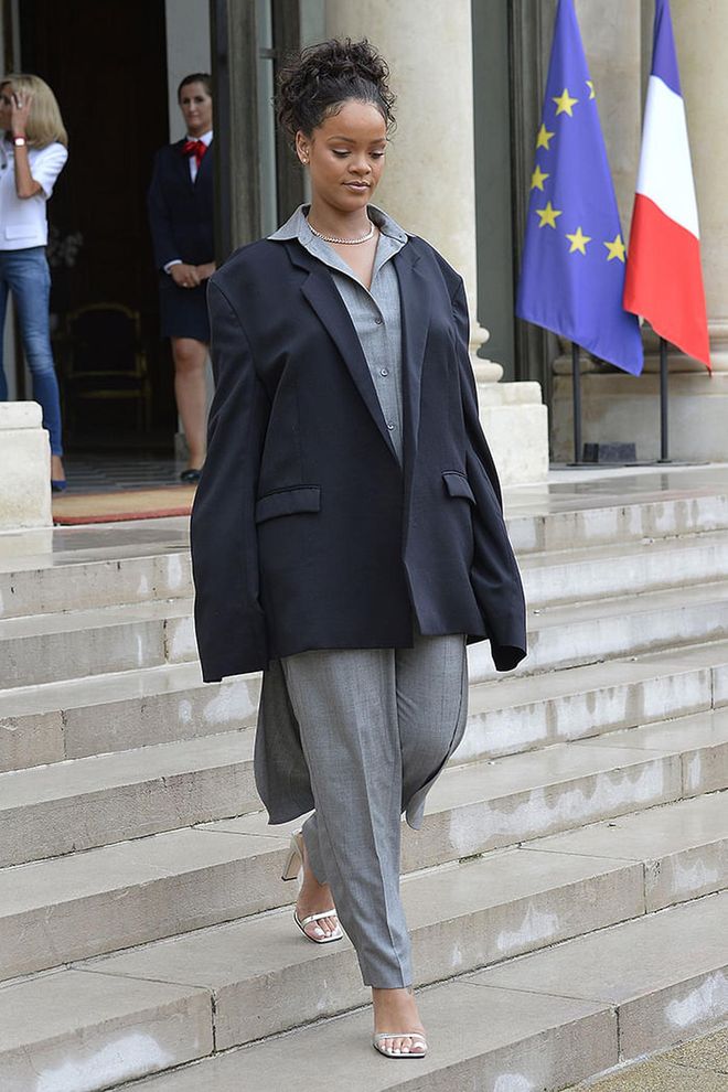 An oversized blazer was what Rihanna chose to wear for her meeting with French President Emmanuel Macron at Elysee Palace. We're sure she slayed the meeting just as how she is slaying the outfit. Photo: Getty