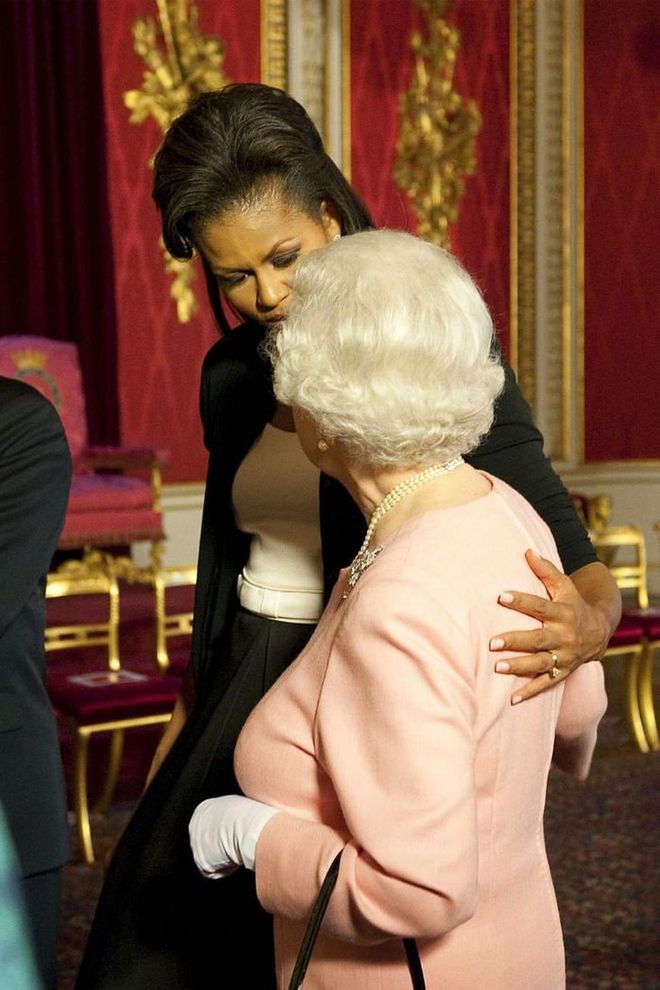 America’s First Lady found herself at the hands of the royal protocol police after placing her arm around the queen at a G20 summit reception in April 2009. It was a moment breathlessly described by one British tabloid as “shocking and out of line,” but for Michelle Obama, she later wrote in her 2018 memoir, Becoming, that they were just “two tired ladies oppressed by our shoes … I did what’s instinctive to me any time I feel connected to a new person.”

Photo: Shutterstock