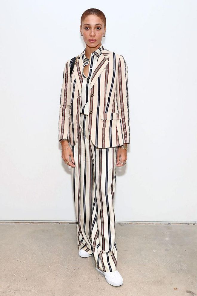 Adwoa Aboah styled her striped suit with casual trainers.

Photo: Cindy Ord / Getty