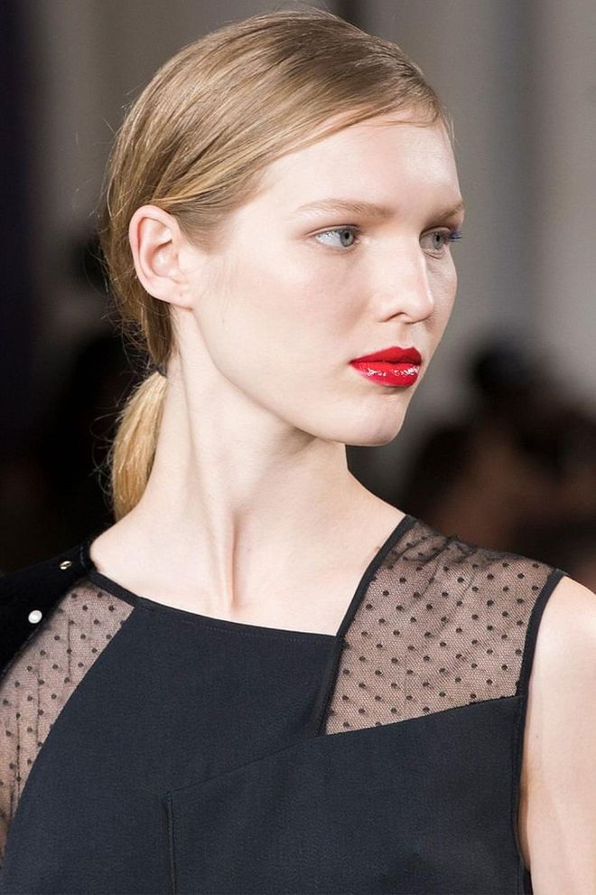 Anything other than a low ponytail with a deep side-part would have felt too glam or precious backstage at Jason Wu.