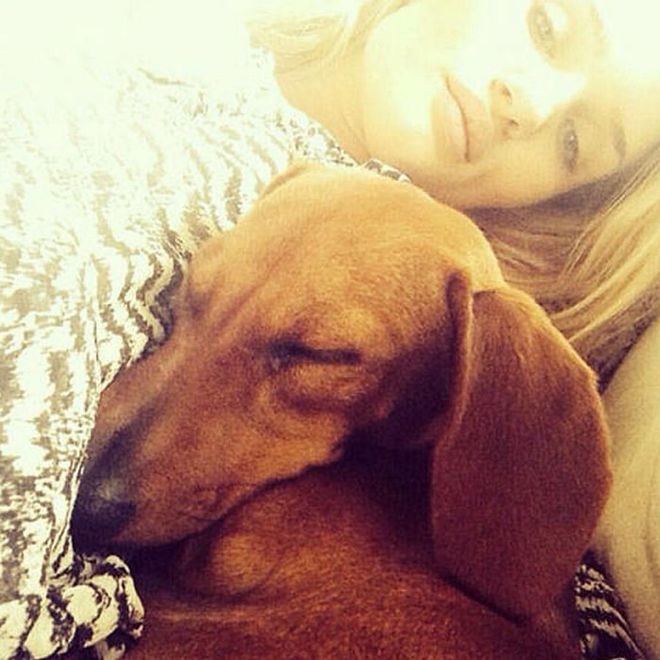 Amp up the cute-factor by posing with a furry friend like Rosie Huntington-Whiteley. Photo: Instagram