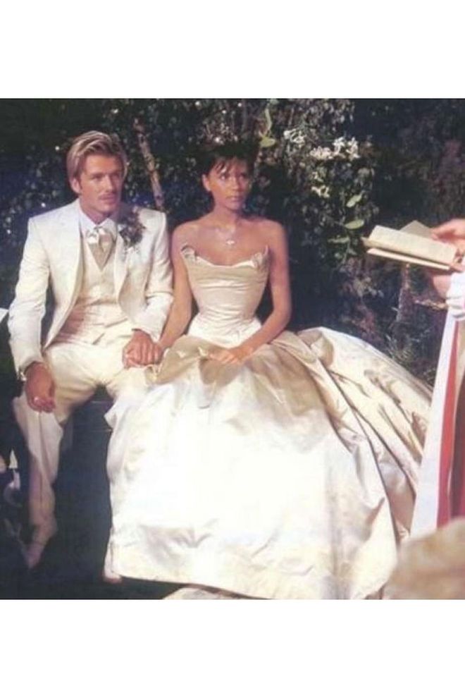 Leave it to the most stylish Spice Girl to choose a timeless ivory gown for her wedding day. According to Business Insider, fashion designer Victoria Beckham wore a custom Vera Wang dress worth an estimated $100,000 for her July 4, 1999, nuptials to soccer superstar David Beckham.