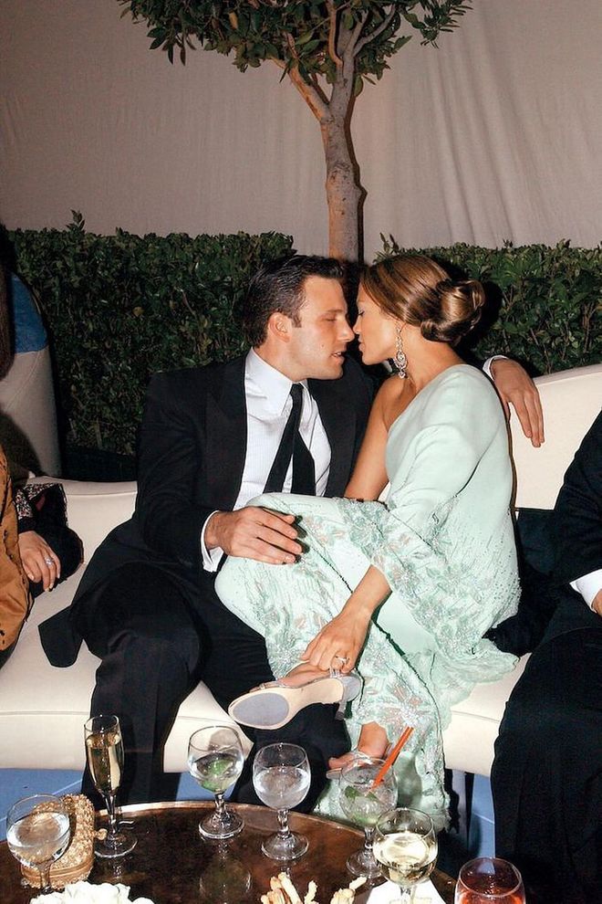 Affleck and Lopez share a moment of PDA at the 2003 Vanity Fair Oscar Party. (Photo: Patrick McMulland/Getty Images)
