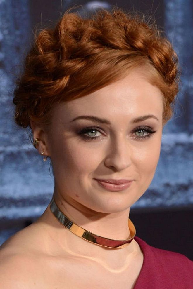 Sophie Turner opted for a chunky milkmaid braid for the premiere of HBO's Game of Thrones season 6. This simple plait can be worn in a similarly relaxed, none-too-neat manner, or can be made much sleeker and tighter; it is also perfect for those with a fringe that can be left out of the braid, as Turner has done. Photo: Getty 